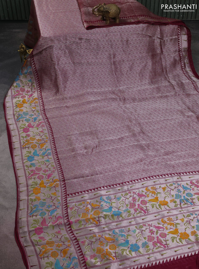 Banarasi semi raw silk saree wine shade with allover silver woven brocade weaves and floral design paithani border