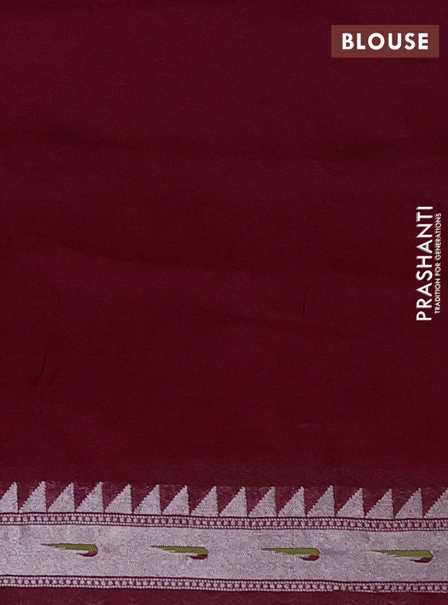 Banarasi semi raw silk saree wine shade with allover silver woven brocade weaves and floral design paithani border
