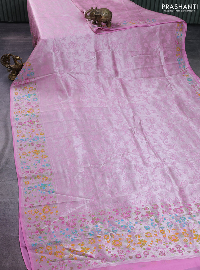Banarasi semi raw silk saree light pink with allover silver zari woven floral weaves and floral design paithani border