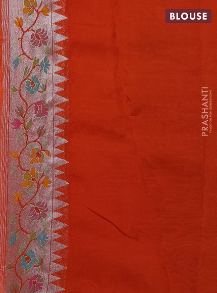 Banarasi semi raw silk saree orange with allover silver zari woven floral weaves and floral design paithani border