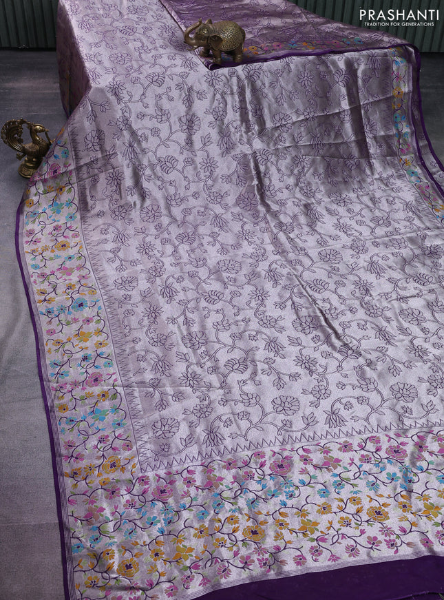 Banarasi semi raw silk saree violet with allover silver zari woven floral weaves and floral design paithani border