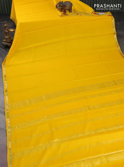 Pure mysore silk saree yellow with plain body and zari woven border