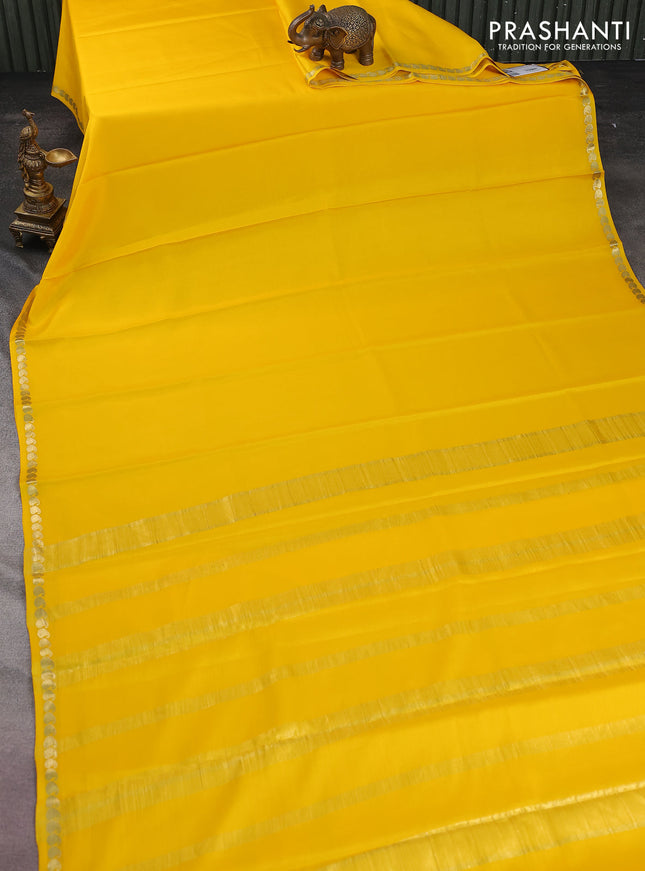 Pure mysore silk saree yellow with plain body and zari woven border