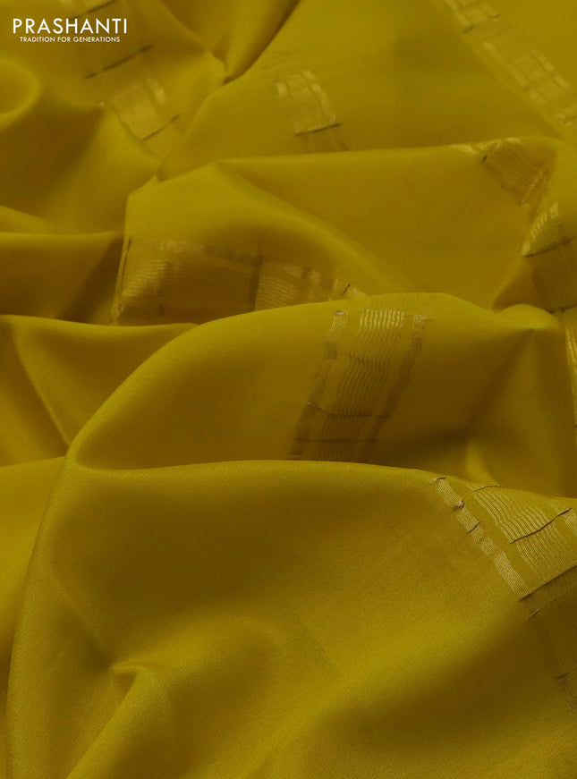 Pure mysore silk saree lime yellow with plain body and zari woven border