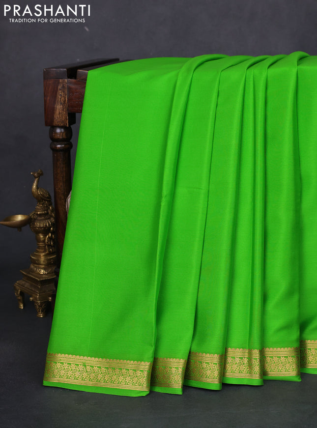 Pure mysore silk saree light green with plain body and zari woven border