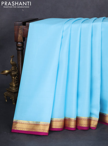Pure mysore silk saree light blue and dark magenta pink with plain body and zari woven border