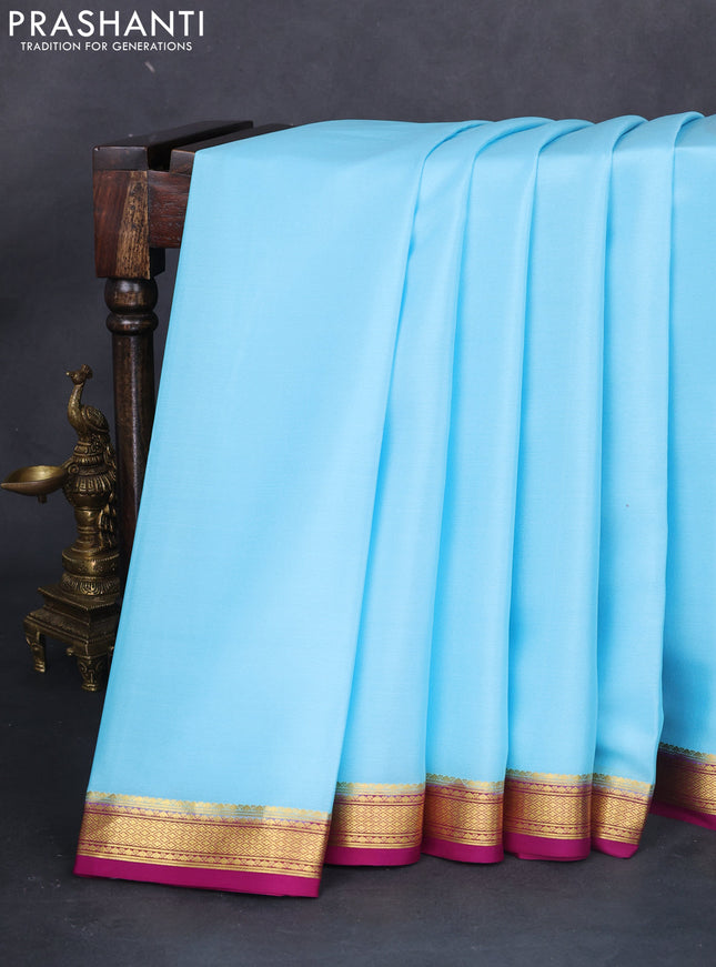 Pure mysore silk saree light blue and dark magenta pink with plain body and zari woven border