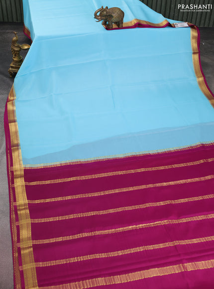 Pure mysore silk saree light blue and dark magenta pink with plain body and zari woven border
