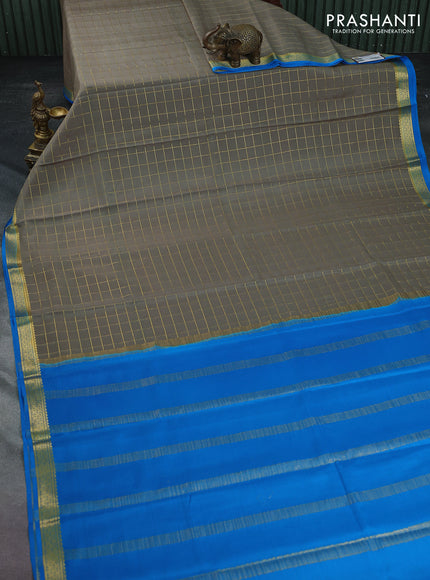 Pure mysore silk saree grey and cs blue with allover zari checked pattern and zari woven border