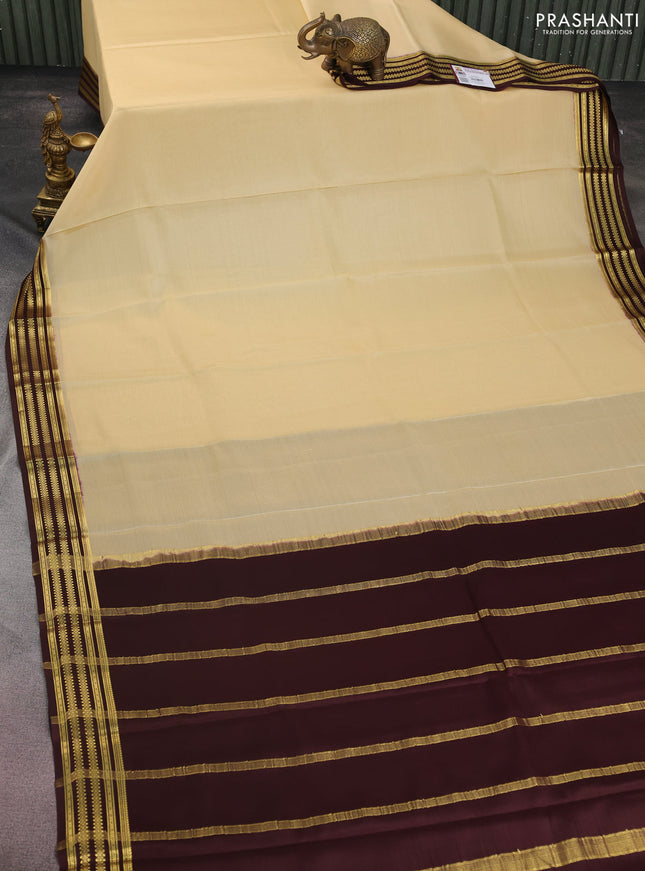 Pure mysore silk saree sandal and brown with plain body and zari woven border