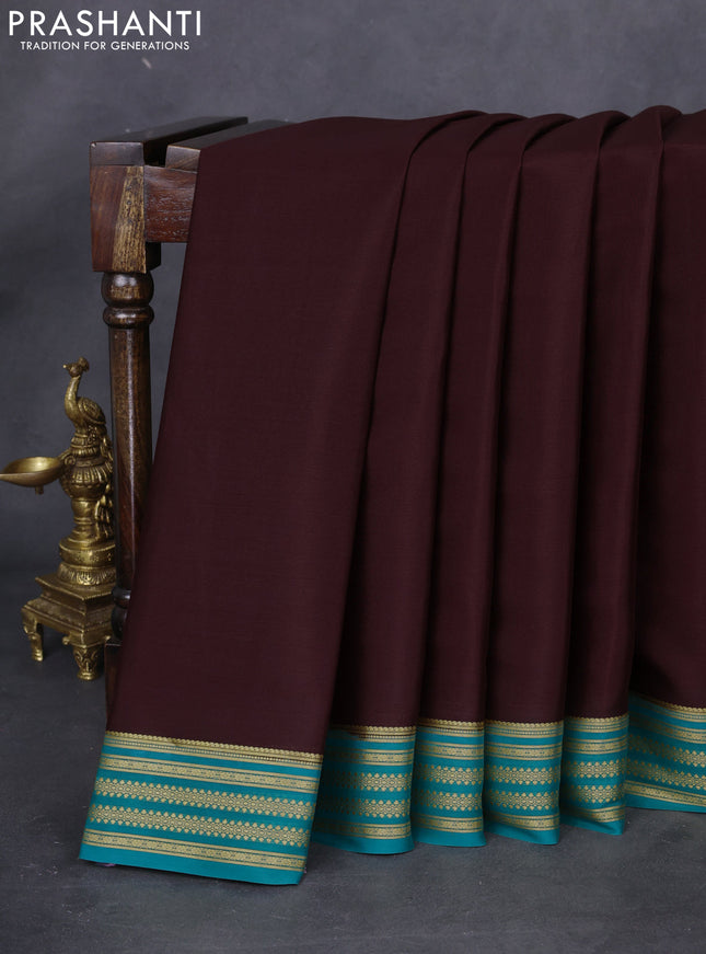 Pure mysore silk saree brown and teal green with plain body and zari woven border
