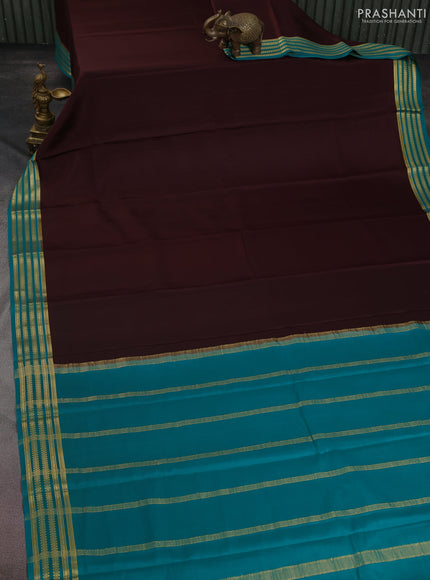 Pure mysore silk saree brown and teal green with plain body and zari woven border