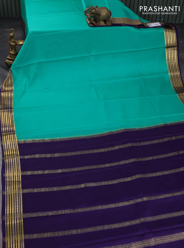 Pure mysore silk saree green and blue with plain body and zari woven border
