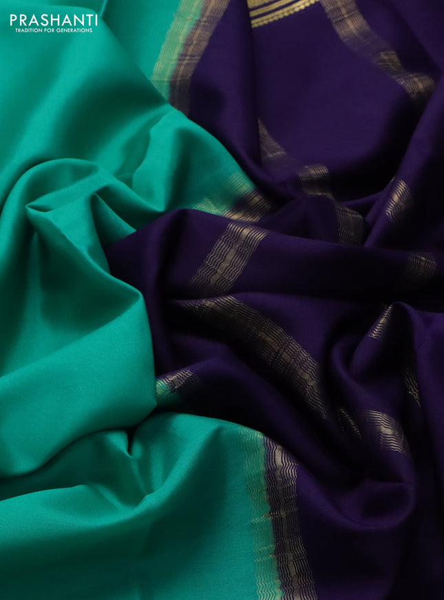 Pure mysore silk saree green and blue with plain body and zari woven border