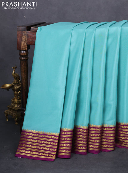 Pure mysore silk saree teal blue and purple with plain body and zari woven border