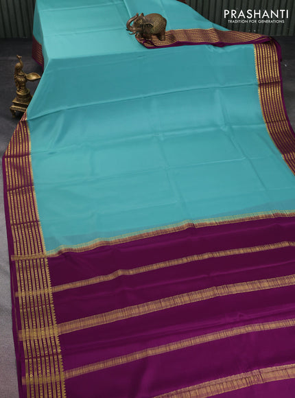 Pure mysore silk saree teal blue and purple with plain body and zari woven border
