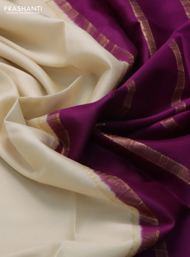 Pure mysore silk saree cream and purple with plain body and zari woven border