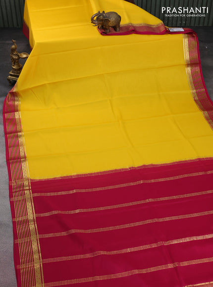 Pure mysore silk saree yellow and dark pink with plain body and zari woven border