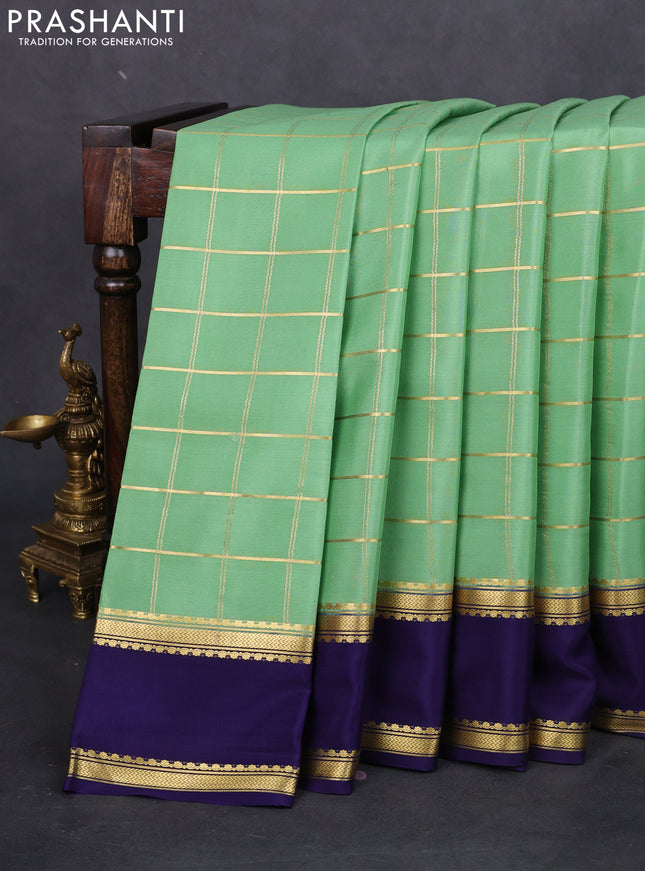 Pure mysore silk saree pastel green and navy blue with allover zari checked pattern and rettapet zari woven border
