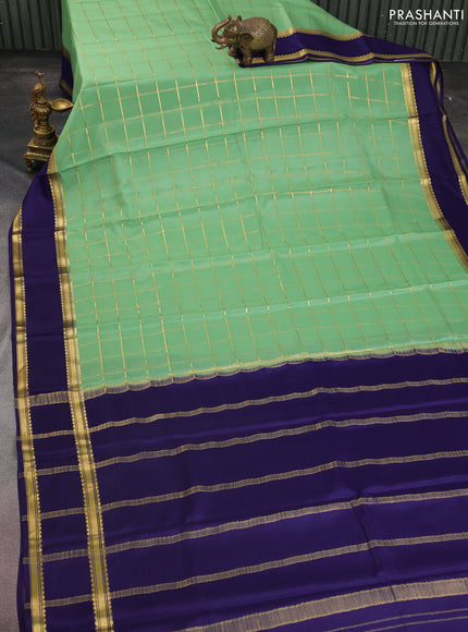 Pure mysore silk saree pastel green and navy blue with allover zari checked pattern and rettapet zari woven border