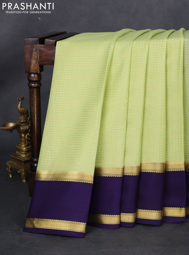 Pure mysore silk saree pista green and dark blue with allover small zari checked pattern and rettapet zari woven border