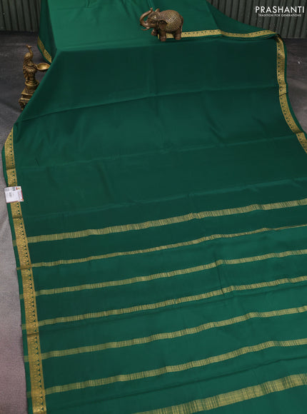 Pure mysore silk saree bottle green with plain body and zari woven border
