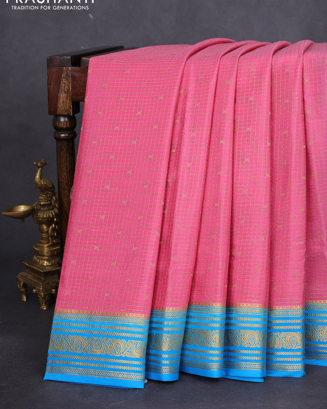 Pure mysore silk saree peach pink and cs blue with allover zari checks & buttas and zari woven border
