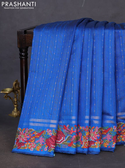 Pure dupion silk saree cs blue with allover zari weaves and floral embroidery border