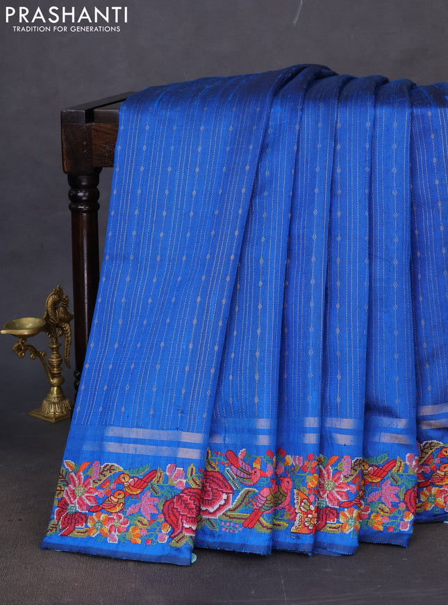 Pure dupion silk saree cs blue with allover zari weaves and floral embroidery border