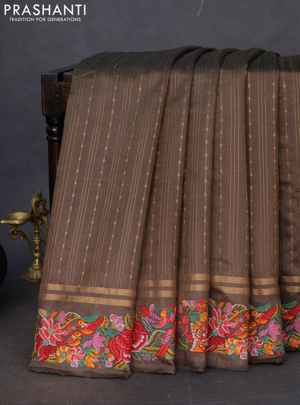 Pure dupion silk saree sap green with allover zari weaves and floral embroidery border