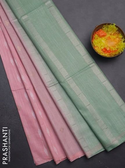 Semi bamboo saree peach shade and pastel green with thread & zari woven buttas in borderless style