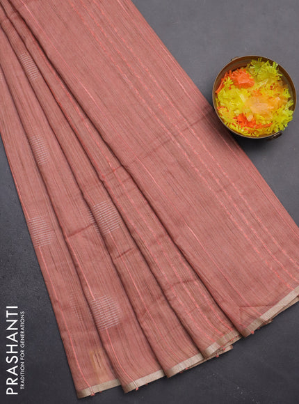 Semi bamboo saree peach shade with woven buttas and zari woven piping border