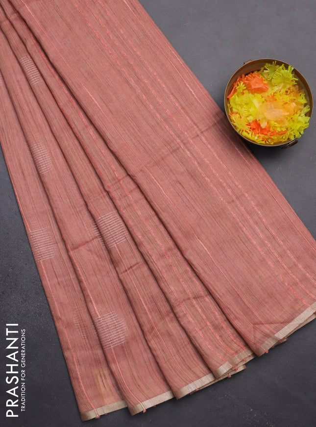 Semi bamboo saree peach shade with woven buttas and zari woven piping border
