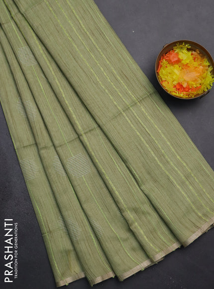 Semi bamboo saree pista green with woven buttas and zari woven piping border