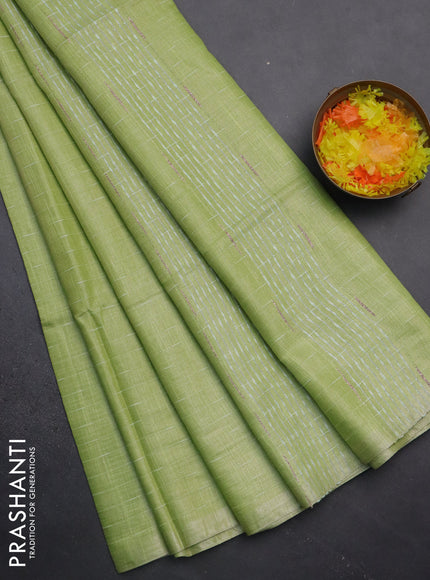 Semi bamboo tissue saree light green with allover thread weaves in borderless style