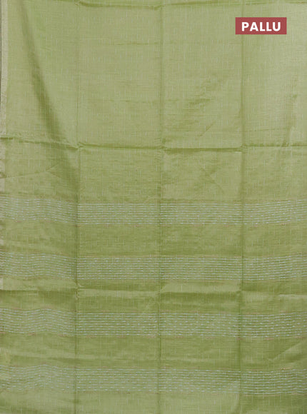 Semi bamboo tissue saree light green with allover thread weaves in borderless style