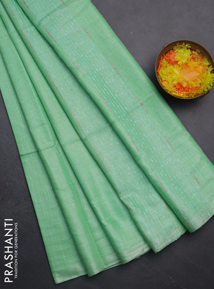 Semi bamboo tissue saree teal green with allover thread weaves in borderless style
