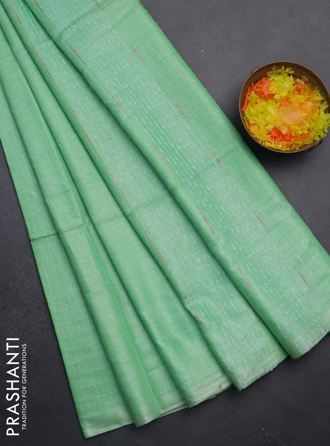 Semi bamboo tissue saree teal green with allover thread weaves in borderless style