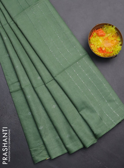 Semi bamboo saree green shade with silver zari woven buttas in borderless style