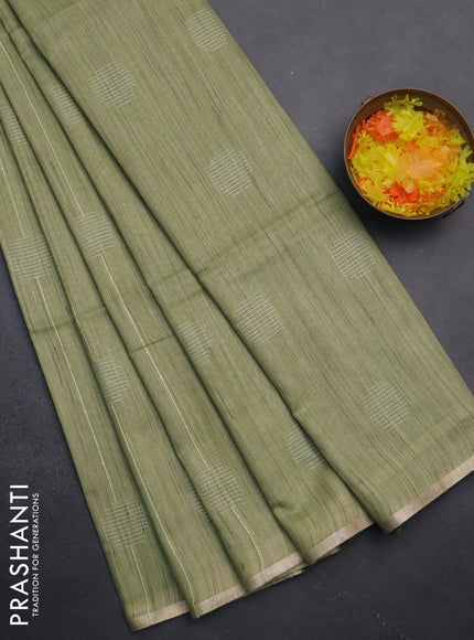 Semi bamboo saree pista green with thread & sequin weaves and zari woven piping border
