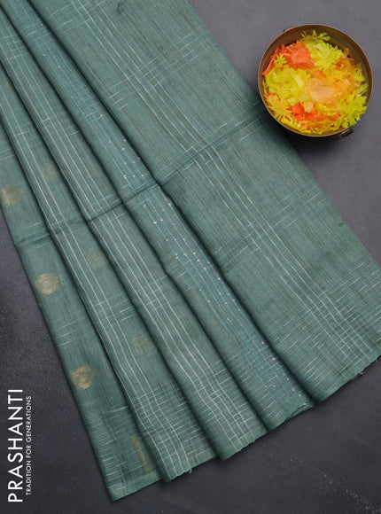 Semi bamboo saree pastel green with allover thread weaves & zari buttas and woven border