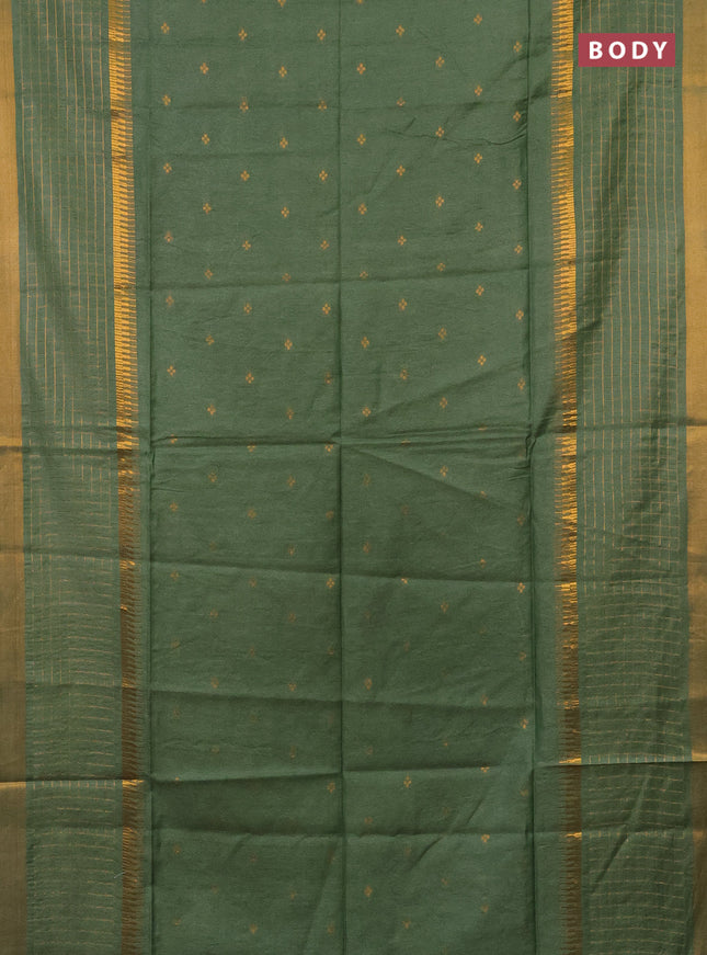 Semi bamboo saree pastel green with zari woven buttas and long zari checked border