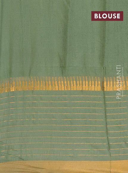Semi bamboo saree pastel green with zari woven buttas and long zari checked border