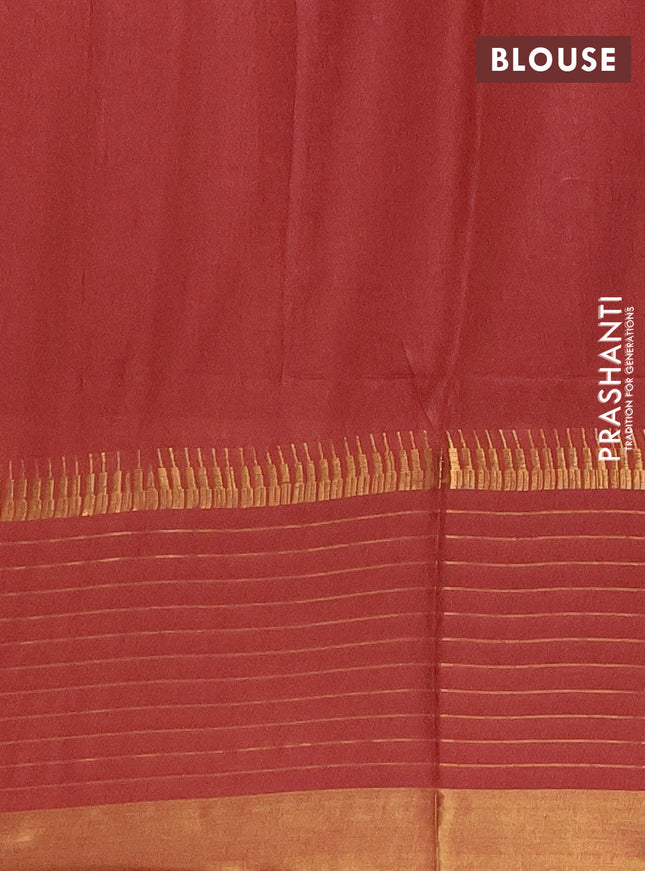 Semi bamboo saree rust shade with zari woven buttas and long zari checked border