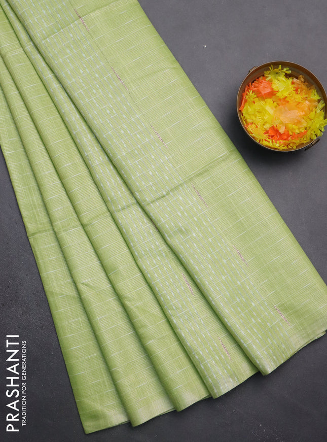 Semi bamboo tissue saree light green with allover thread weaves in borderless style