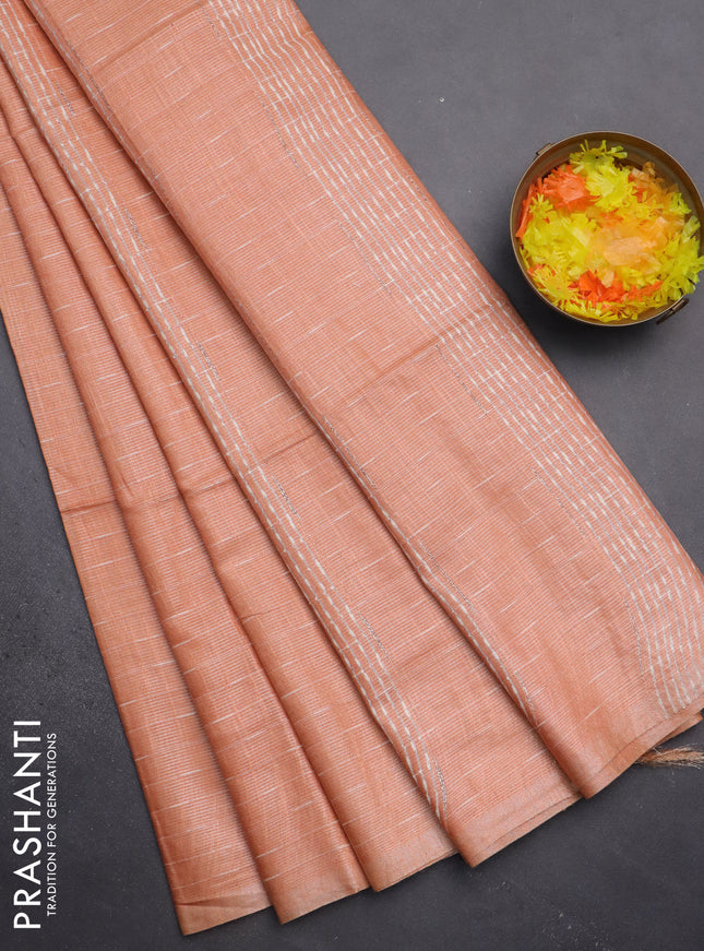 Semi bamboo tissue saree peach orange with allover thread weaves in borderless style