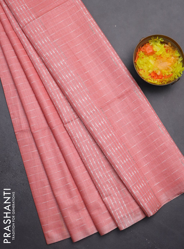 Semi bamboo tissue saree peach shade with allover thread weaves in borderless style