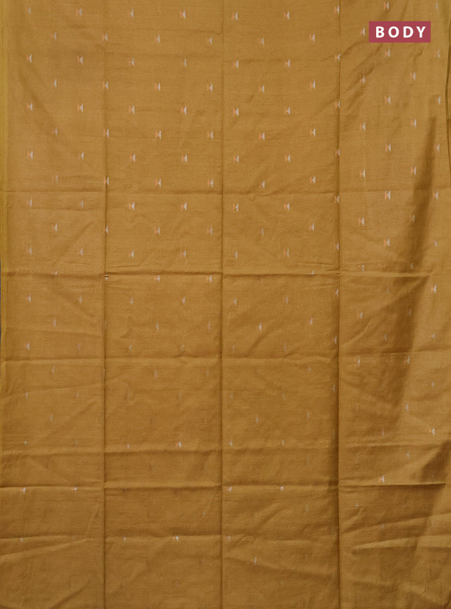 Semi bamboo saree mustard shade with silver & copper zari buttas in borderless style