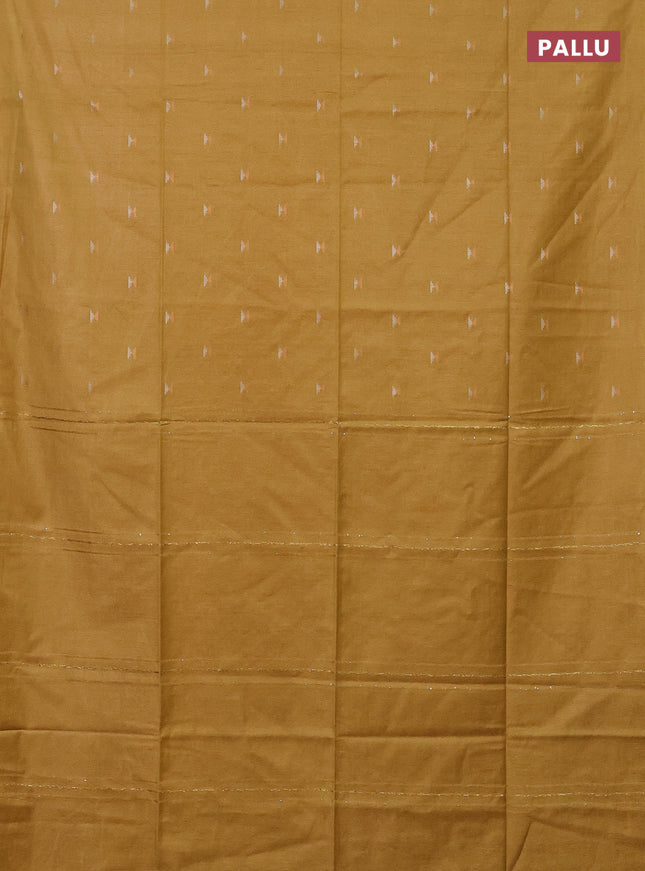 Semi bamboo saree mustard shade with silver & copper zari buttas in borderless style