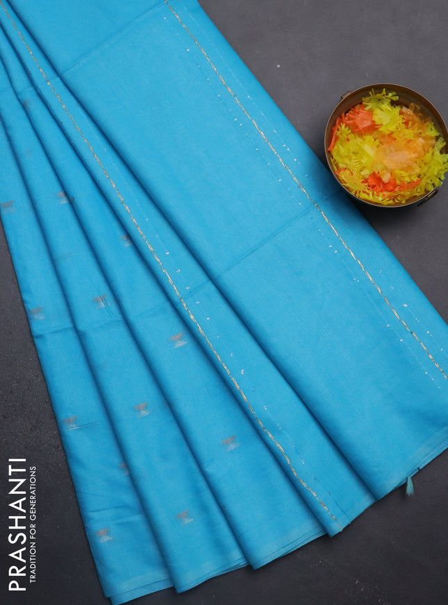 Semi bamboo saree light blue with silver & copper zari buttas in borderless style